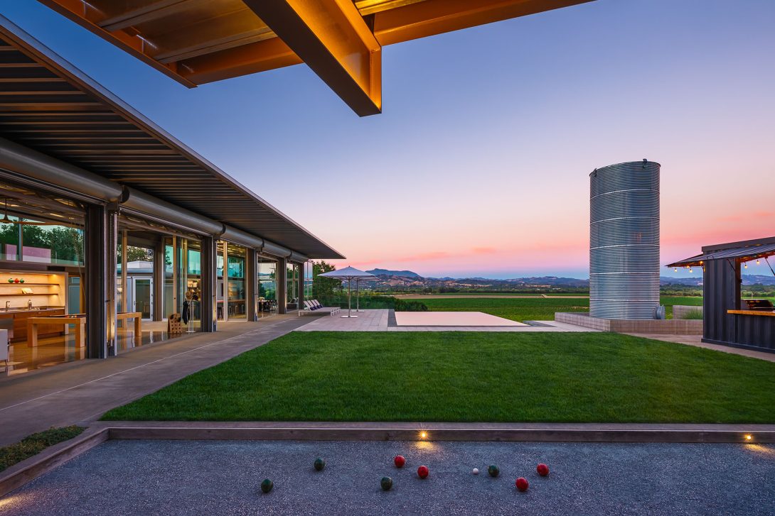 View of the lawn and landscape beyond at sunset, Healdsburg House
